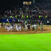 The Oklahoma Sooners softball team on the field after winning the National Championship.