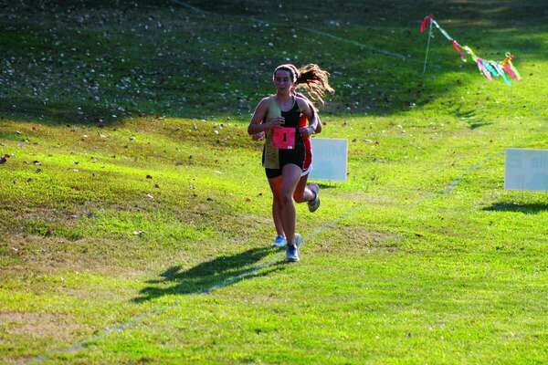 Kaycie Stahl leading all runners around the 1 mile mark at Highland.