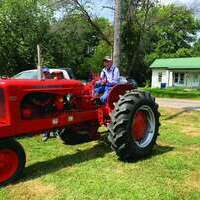 John Henderson with his vintage tractor