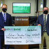 Dr. Douglas B. Palmer, left, president of Culver-Stockton College, and Josh Wilson, community bank president of HOMEBANK’s Northeast Missouri market, hold a check for $15,000 that will be used toward the construction of the Student Experience Center at Culver-Stockton College.