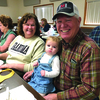 Kent and Angie Stahl of Camp Point, Ill., with their granddaughter.